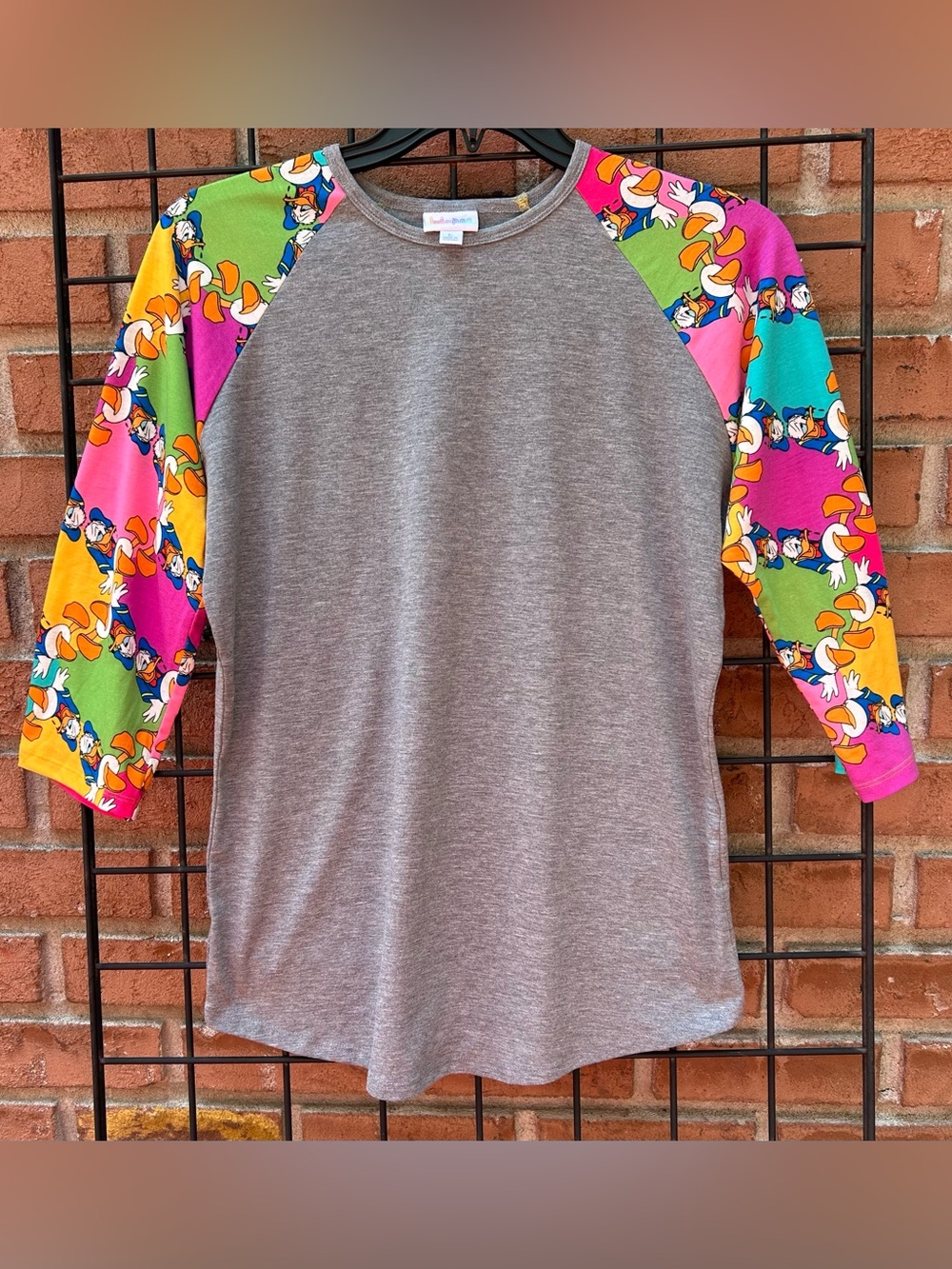 LuLaRoe Disney Donald Duck Gray Raglan Top with Multicolor Sleeves